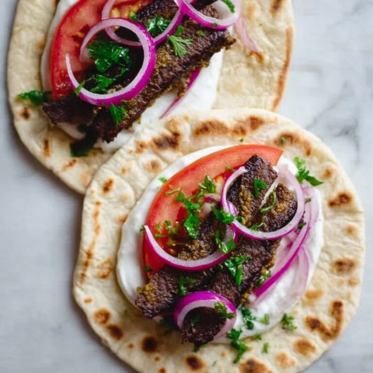 Juicy Oven-Baked Kebabs with Sumac Onions and Garlic Yoghurt Recipe