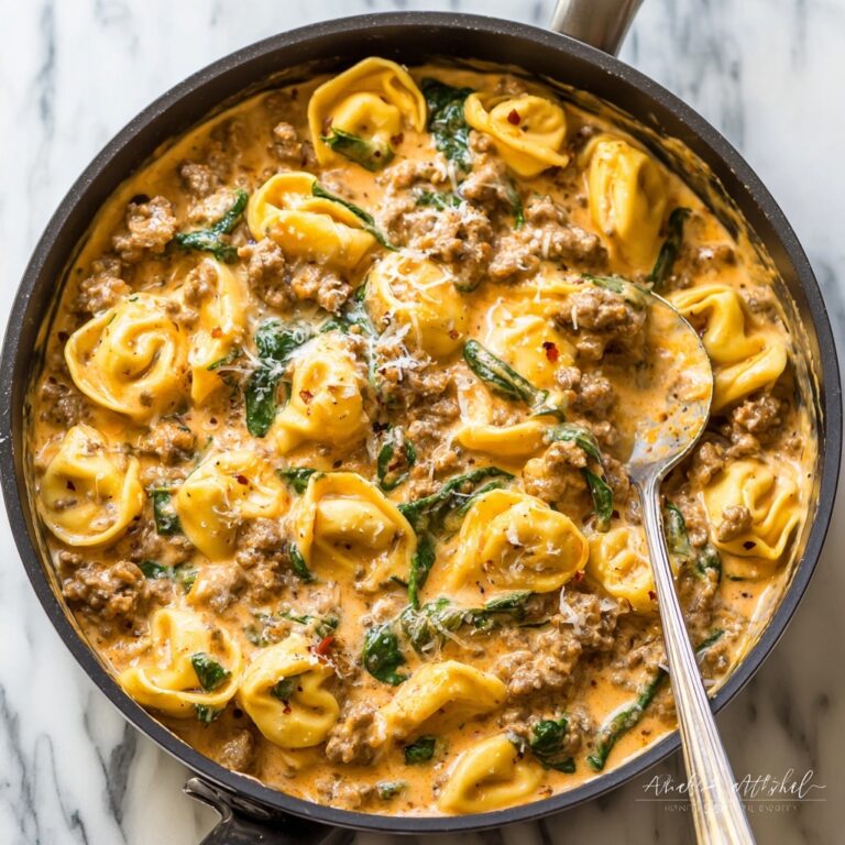 Slow Cooker Sausage and Cheese Tortellini with Spinach and Tomatoes Recipe